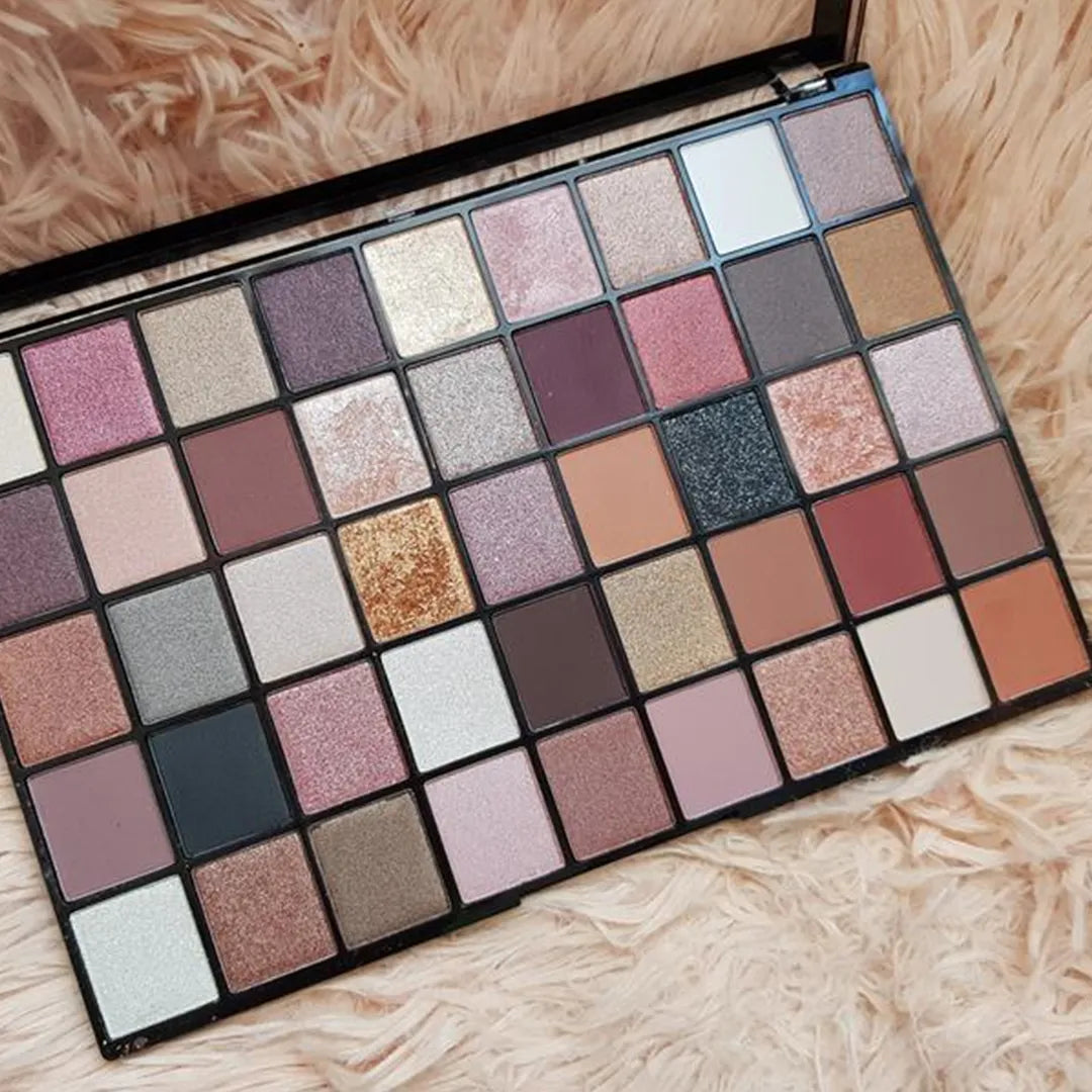 Close-up of Makeup Revolution Maxi Reloaded Large It Up Palette with matte and shimmer eyeshadows