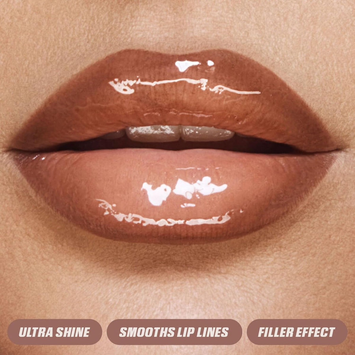 Close-up of glossy nude lips illustrating Huda Beauty Faux Filler Lip Gloss shine and smoothing effect
