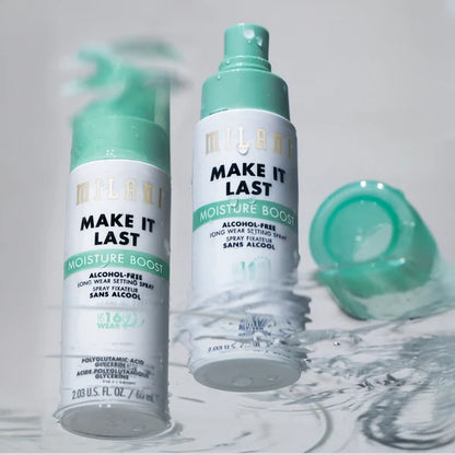 Milani Make It Last Moisture Boost Setting Spray bottles displayed with water for a hydrating effect.