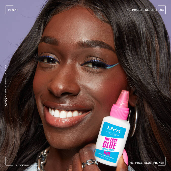 Model holding NYX The Face Glue Gripping Primer for long-lasting makeup