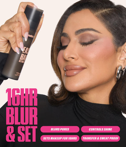 Model using Huda Beauty Easy Bake Setting Spray 16 hour blur and set makeup