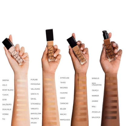 NARS Natural Radiant Longwear Foundation shade swatches on different skin tones with bottles in hand