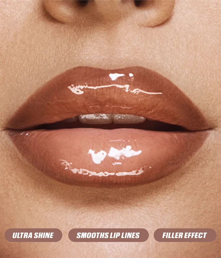Glossy brown lips highlighting Huda Beauty Faux Filler gloss shine, smoothing effect and fuller-looking finish