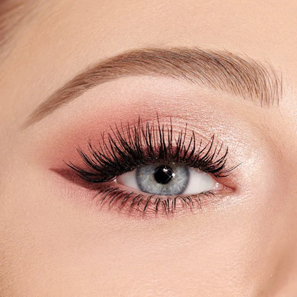 Shimmering rose-gold winged eye look using Charlotte Tilbury Pillow Talk Beautyverse Love Palette.