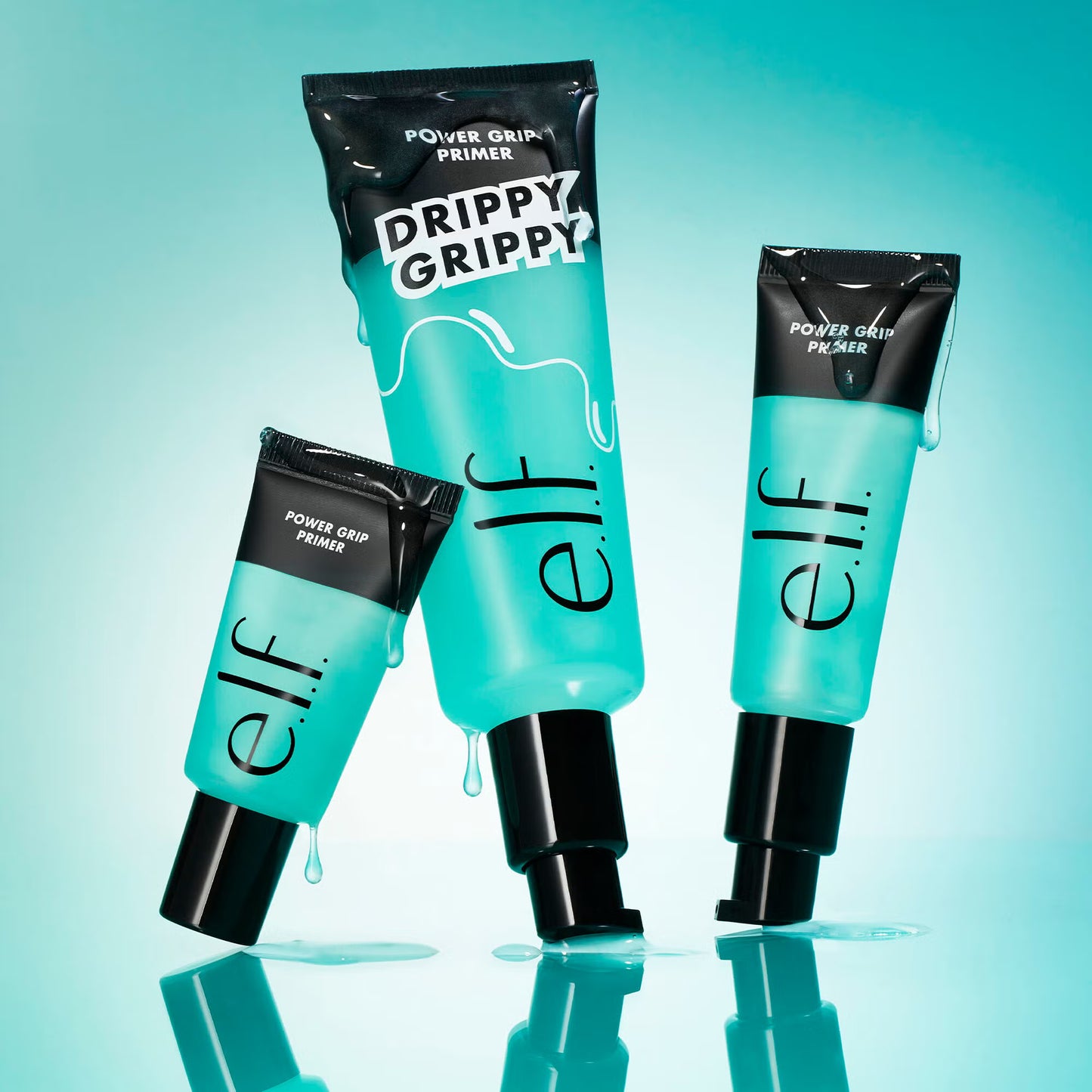 Three tubes of e.l.f. Power Grip Primer hydrating makeup primer on blue background