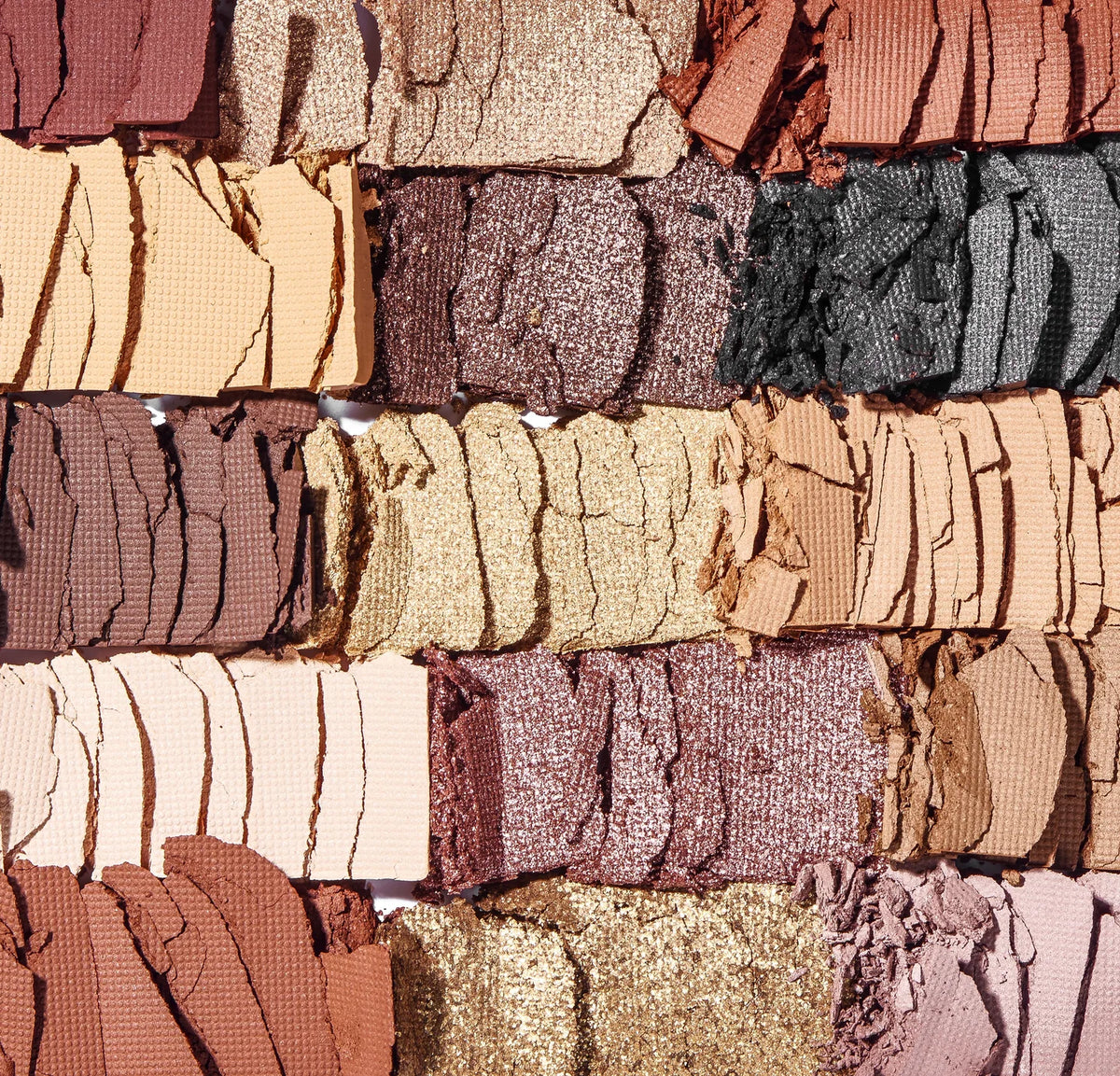 Close-up of crushed Revolution Reloaded Velvet Rose eyeshadows showing matte and shimmer textures