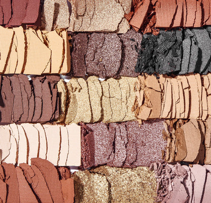 Close-up of crushed Revolution Reloaded Velvet Rose eyeshadows showing matte and shimmer textures