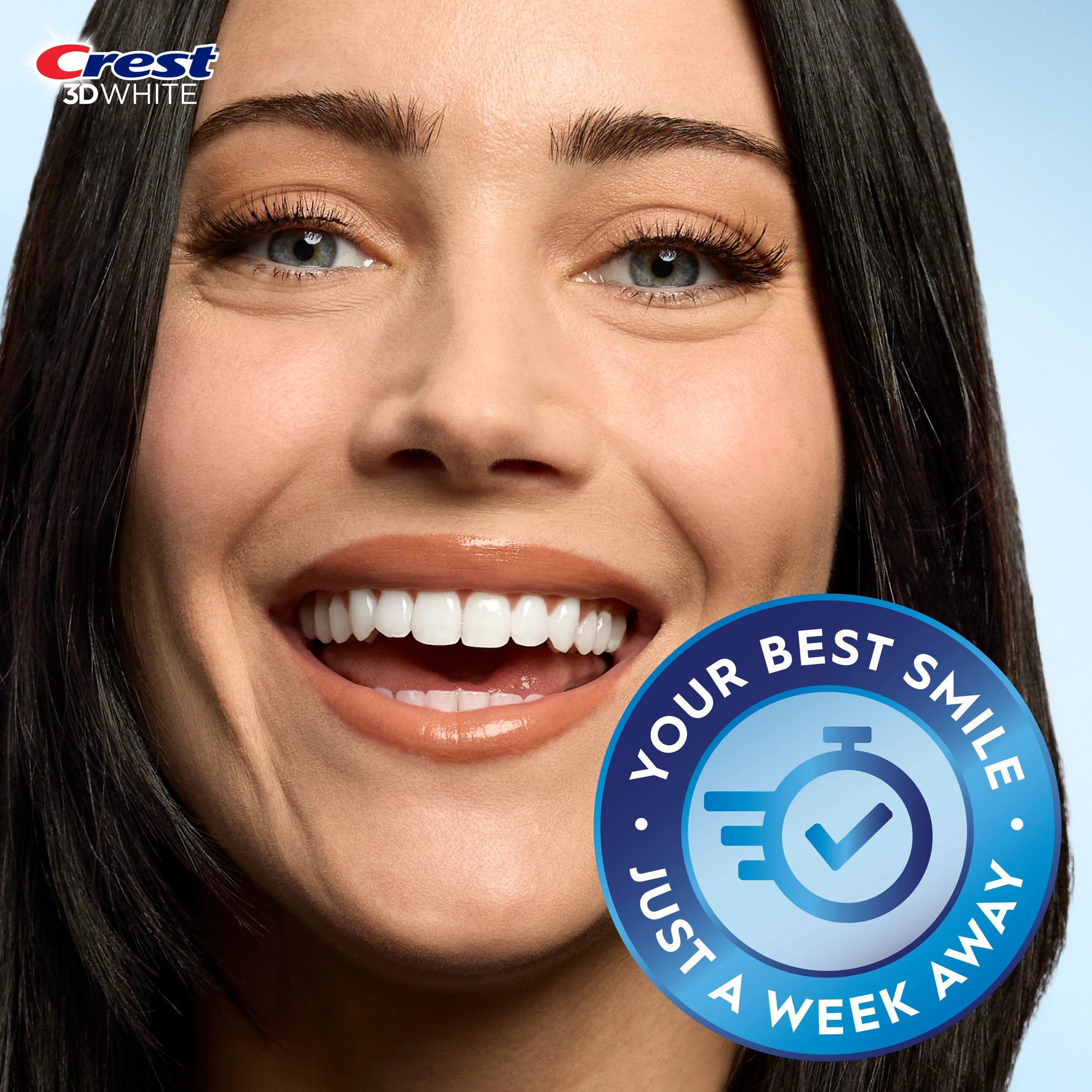 Woman smiling with Crest 3D Whitestrips one-week smile transformation badge